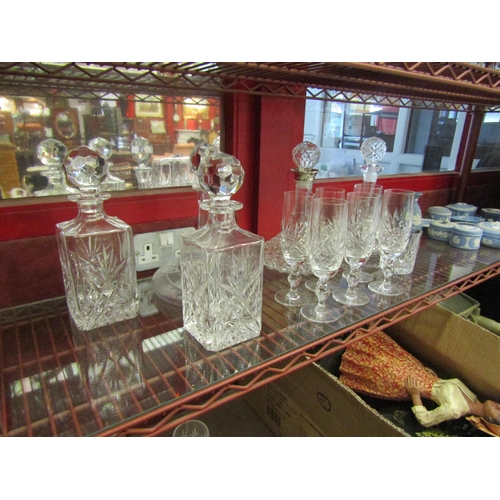 4463 - Two crystal whisky decanters, three ships decanters, six champagne flutes etc