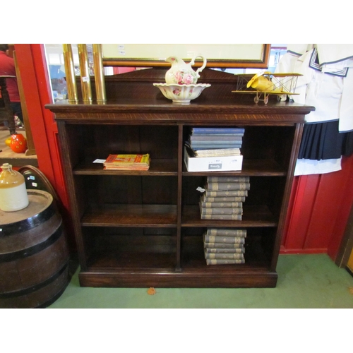 4024 - Circa 1900 an oak side by side bookshelf the raised back over six height adjustable shelves on a pli... 