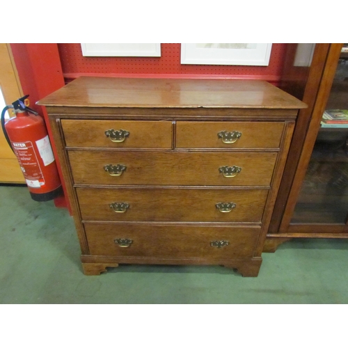 4034 - A 19th Century oak two over three chest of drawers on bracket feet, handle missing, 88cm high x 88cm... 