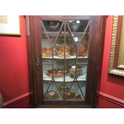 4047 - A Georgian astragal glazed mahogany corner cupboard with string inlay, one pane a/f, 185cm high x 80... 