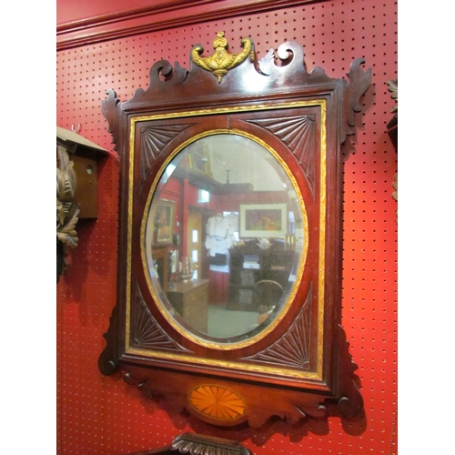 4053 - A mahogany pier mirror, painted gilt Regency style motif and inlay, 83cm x 58cm total