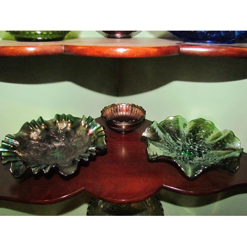 4060 - Eight pieces of Carnival glass, various colours