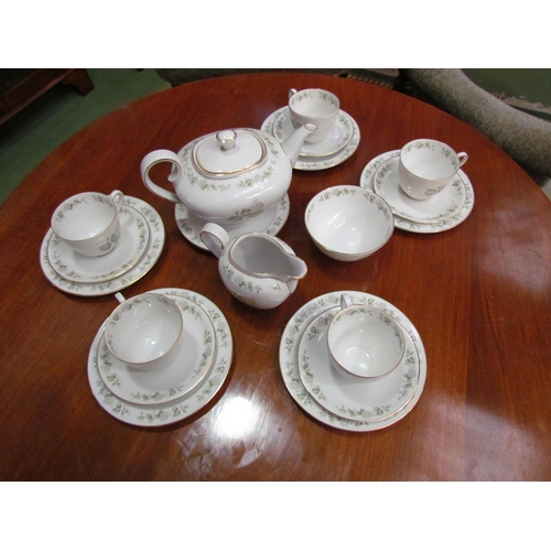 4076 - A part tea/coffee service comprising of teapot, milk jug, sugar bowls, coffee pot, tea and coffee cu... 