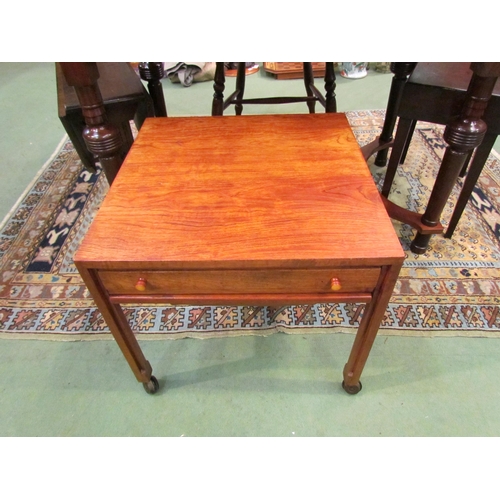 4115 - A mid-20th Century teak free standing sewing table, fitted interior to drawer, 46cm high x 50cm wide... 