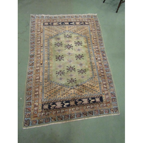 4122 - A green ground Eastern wool rug, three rows of central gulls and multiple borders, 200cm x 145cm