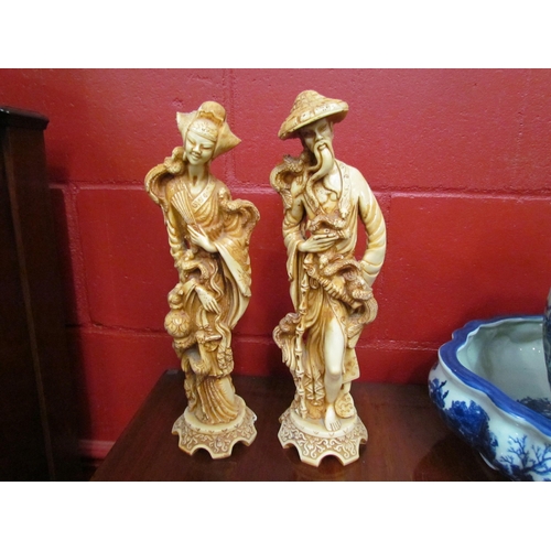 4139 - A blue and white jug and bowl and two oriental resin figures