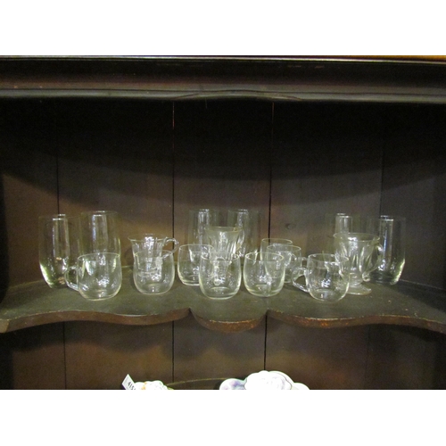 4150 - A selection of glassware including early 20th century examples, custard cups, chips to some