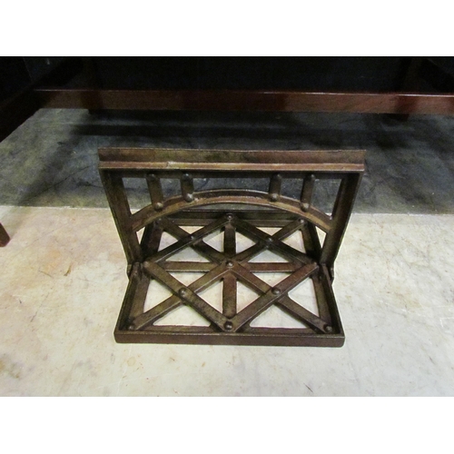 4164 - A wrought iron boot scraper of geometric form