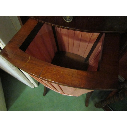 4205A - An early to mid 20th Century sewing table of oval form with single drawer and knitting/wool basket, ... 