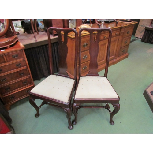 4211 - A pair of George II revival mahogany chairs with pierced vase shaped central splat on 