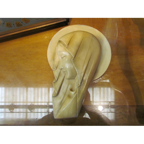 4217 - A plaster Art Deco wall plaque, side profile of a veiled lady, 32cm high