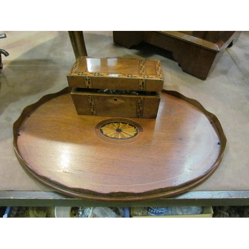 4230 - An Edwardian inlaid mahogany oval tray with brass and wavy edge handles (a/f).  A Victorian walnut t... 