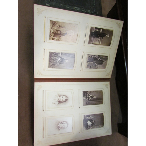 4235 - Three leather bound Victorian photograph albums, some with contents to include royalty