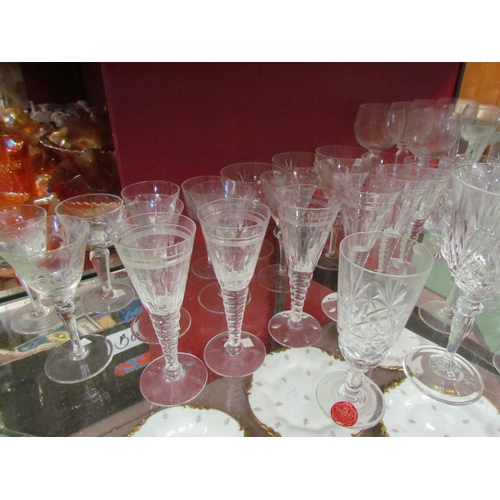 4255 - A collection of cut glass sherry glasses, brandy glasses, to include a set of six Stuart Crystal (qt... 