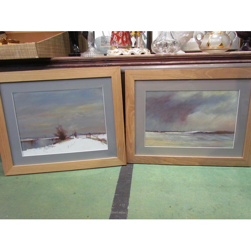 4257 - TREVOR OSBOURNE: Two pastel winter landscape scenes, framed and glazed, 21cm x 32.5cm (2)