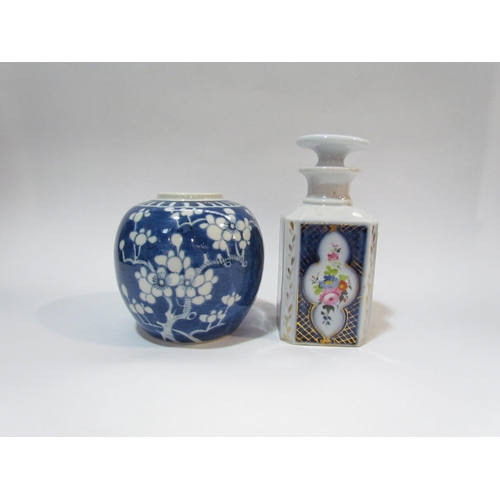 4259 - A Chinese blue ginger jar, prunus design, no lid and a Continental ceramic scent bottle, cobalt blue... 