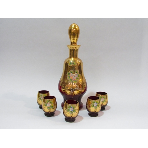 4291 - A gilt liqueur set