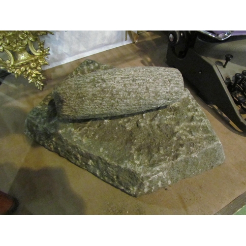 4328 - A granite ethnic grinding tool and base  (R)    £40