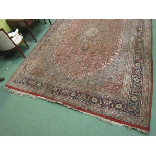 4470 - A red and blue ground rug with classical design, a/f, 303cm x 201cm, torn and stained