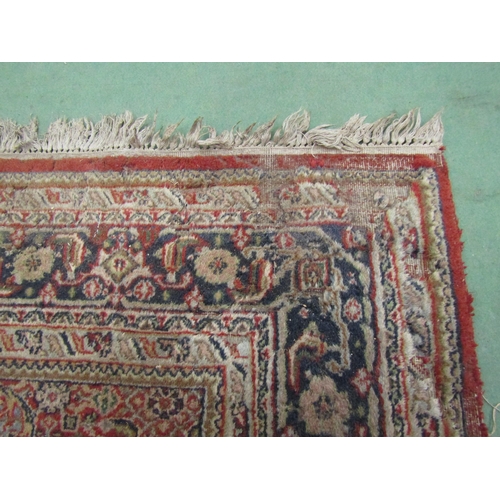 4470 - A red and blue ground rug with classical design, a/f, 303cm x 201cm, torn and stained