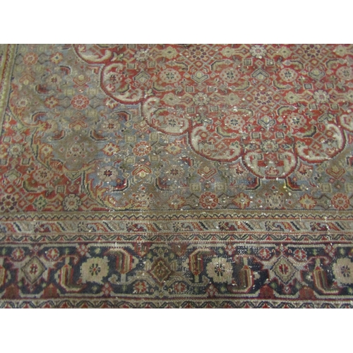 4470 - A red and blue ground rug with classical design, a/f, 303cm x 201cm, torn and stained