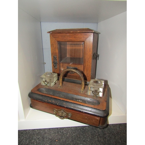 1285 - An Edwardian oak smokers cabinet and desk inkwells (2)