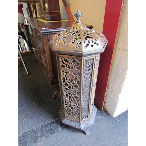 1001 - A Victorian enamelled cast iron floor standing heater with decorative floral detailing, lid with fin... 