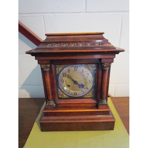 1003 - A 20th Century 8 day bracket clock with brass and silvered Arabic numerate face, some damage, 39cm h... 