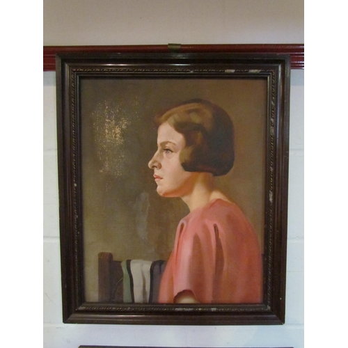 1007 - A 1930's oil on canvas depicting a portrait of a young woman with college scarf to background, frame... 