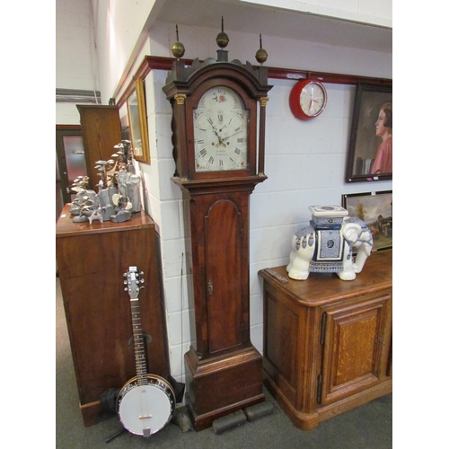 1012 - A late 18th Century mahogany longcase clock, the painted face named 