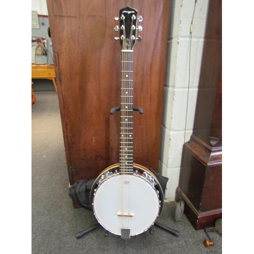 1045 - A Martin Smith banjo-guitar, six string