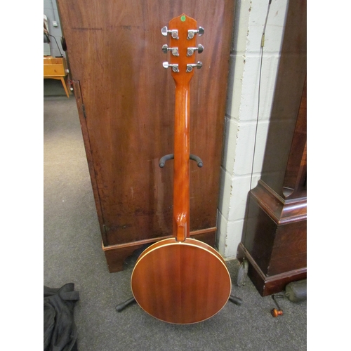 1045 - A Martin Smith banjo-guitar, six string