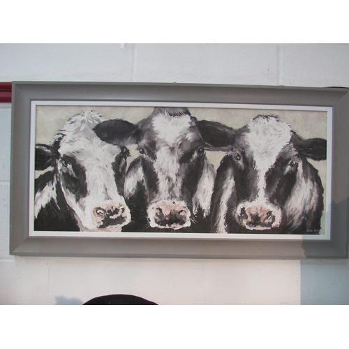 1361 - A Hollie Rose framed print of three Friesian cows, 36cm x 84cm