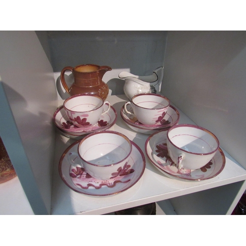 1369 - A blue and white transfer ware chamber pot together with lustre ware tea cups and saucers, etc some ... 