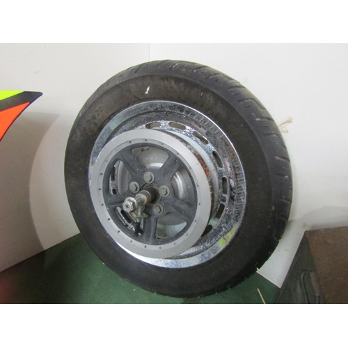 9026 - A motorcycle alloy wheel with tyre    (C)