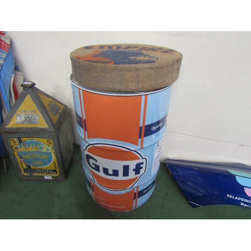 9031 - A Gulf Racing 102 oil drum with a fitted hessian 