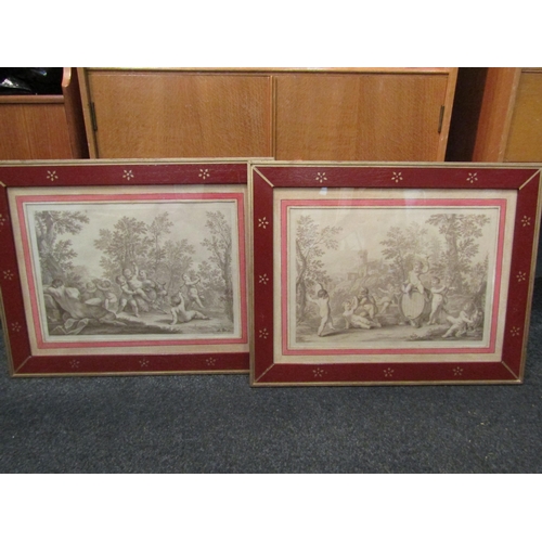 1030 - A pair of Sepia engravings depicting putto playing, red and gilt framed and glazed, 26.5cm x 40cm im... 