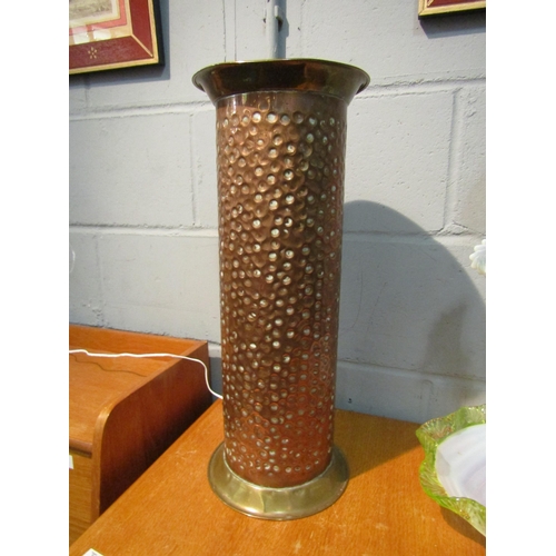 1032 - A retro hammered copper and brass umbrella and stick stand, 50.5cm high