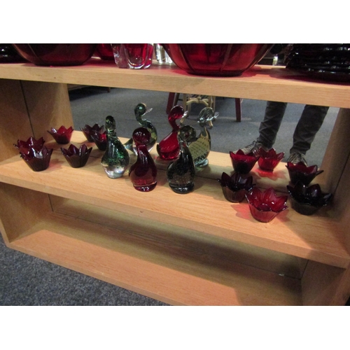 1041 - A collection of Cranberry glass including bowls, dishes, vase and candle holders with three duck fig... 