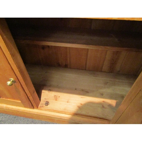 1072 - A pine dresser base with three drawers over three door cupboard, 87cm high x 152cm wide x 45cm deep ... 