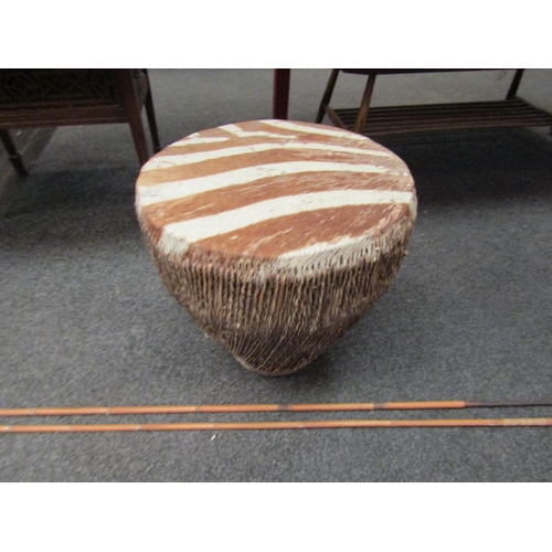 1100 - A Zebra skin drum and two ethnic spears (3)