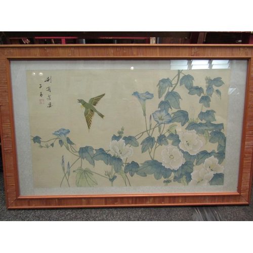 1118 - A framed and glazed Chinese painted fabric panel depicting a bird and foliage. Image size 40cm x 67c... 