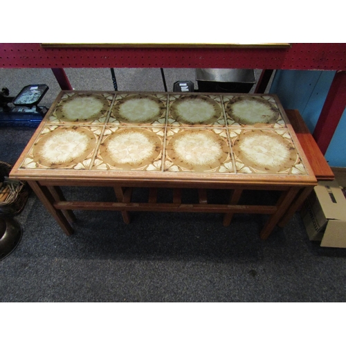 1133 - A retro 1960s tile top coffee table with pull-out side tables