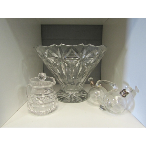 1284 - A heavy cut glass crystal bowl together with silver collared vinegar / oil glass condiment and a lid... 