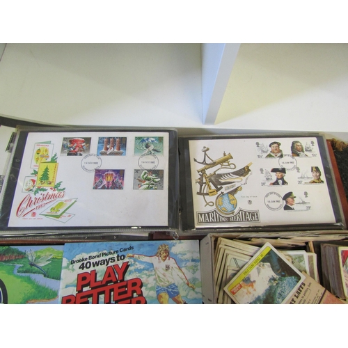 1289 - A collection of tea, cigarette and bubblegum cards and an album of first day covers