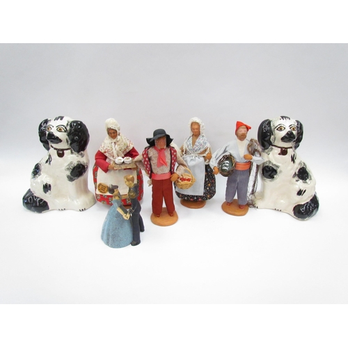 1349 - A pair of Staffordshire style dogs and four 1970's Santonniers  figures including a fisherman and a ... 