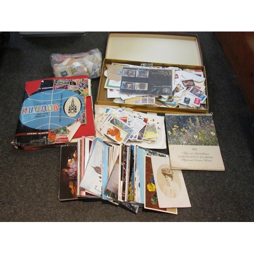 1451 - A box of stamps, postcards etc