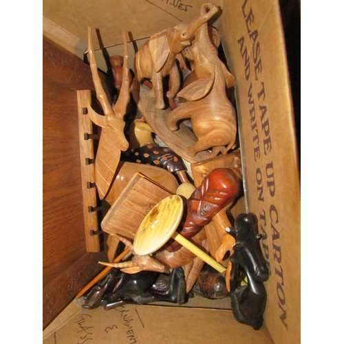 1468 - Two boxes of mixed items, treen, lamp, stone bed warmers, carved wooden animals etc