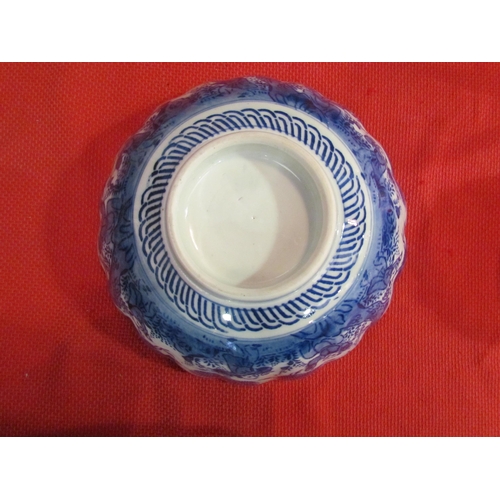 1474 - A Chinese scalloped edge blue and white bowl with figures and prunus, 25cm diameter   (E) £15-30