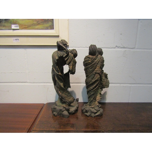 1056 - Two bronze effect figural groups of semi-clad couples embracing, 39cm and 36cm high   (R) £80